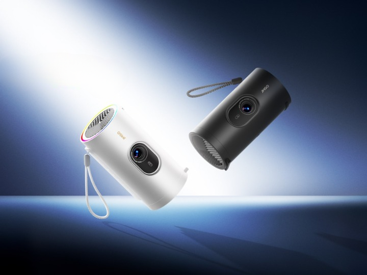 Compact JmGO PicoPlay projector with Android TV streaming movies on a wall