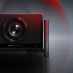 Teaser image of Xgimi Titan projector highlighting its sleek form and lens design.