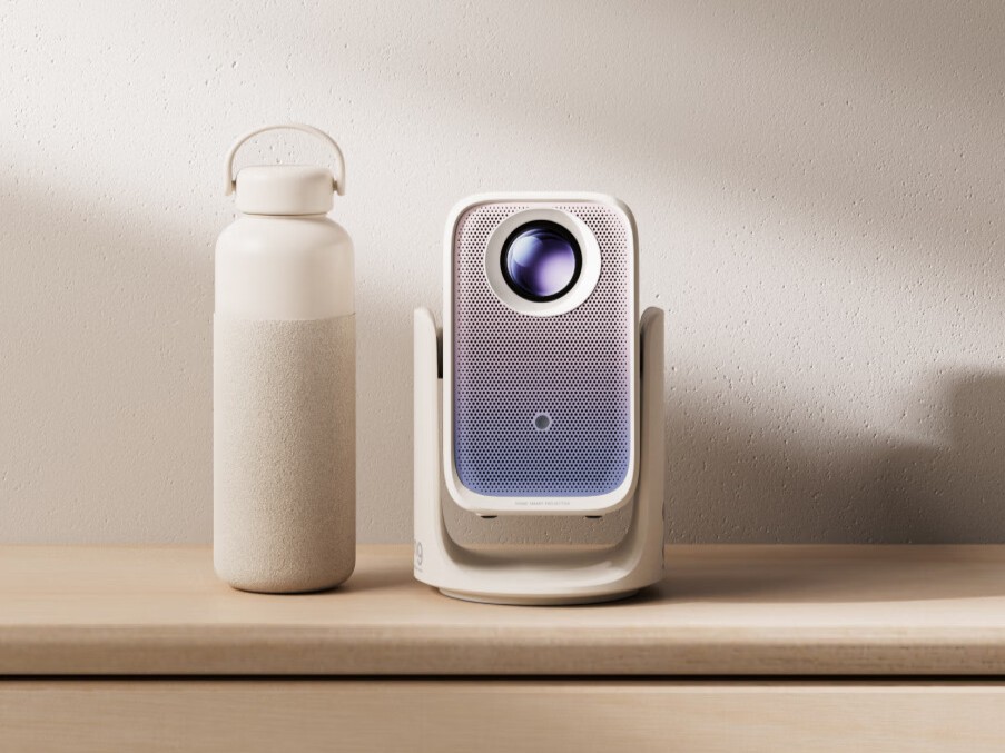 Xming Q6 Neo projector angled on its dual-arm gimbal stand projecting a vivid image