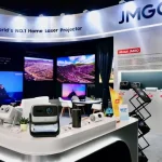 JMGO O2S Ultra 4K projector delivering a giant cinematic image from ultra-short distance in a stylish living room setting