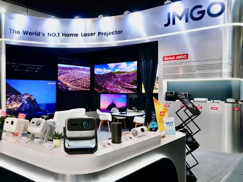 JMGO O2S Ultra 4K projector delivering a giant cinematic image from ultra-short distance in a stylish living room setting