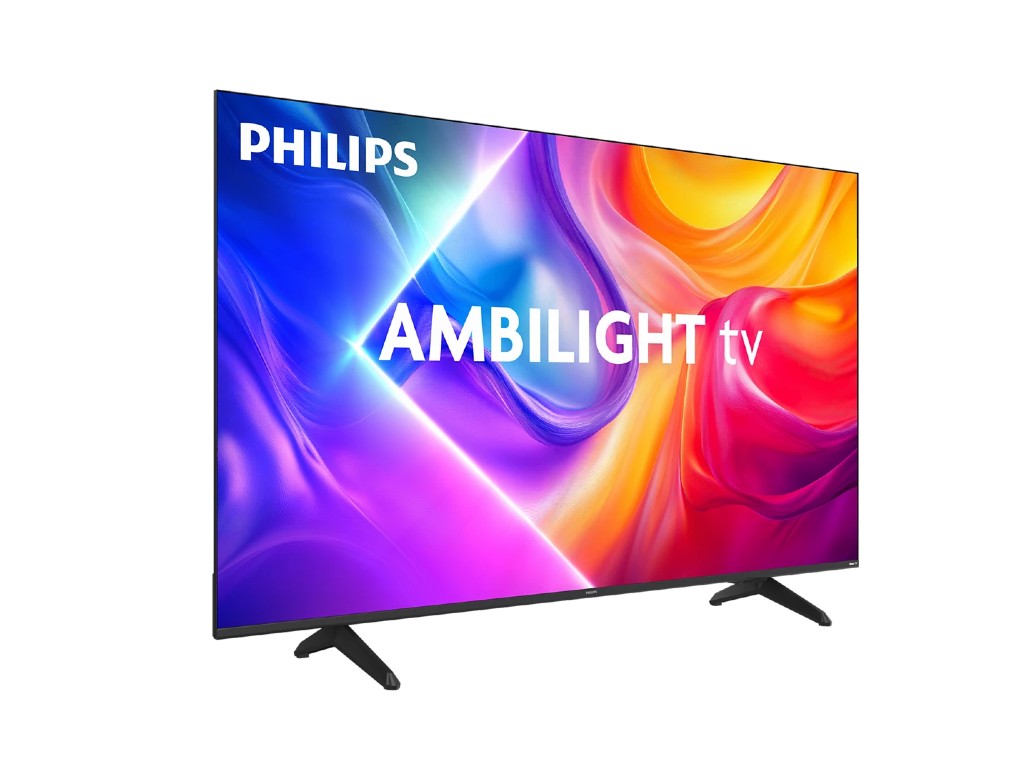 Philips Ambilight Roku TV glowing with immersive backlights in a modern living room.