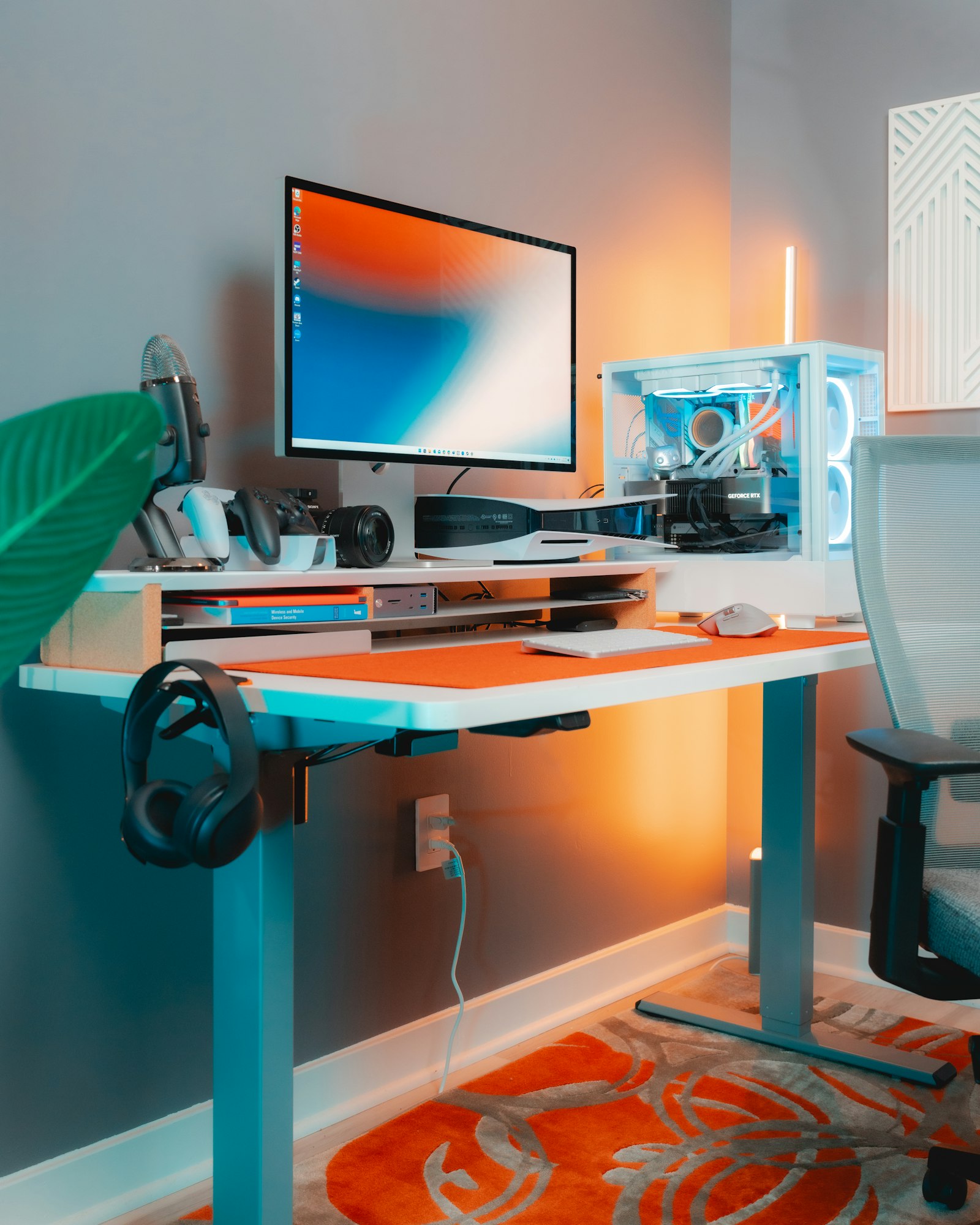 Desk with a computer monitor, keyboard and mouse